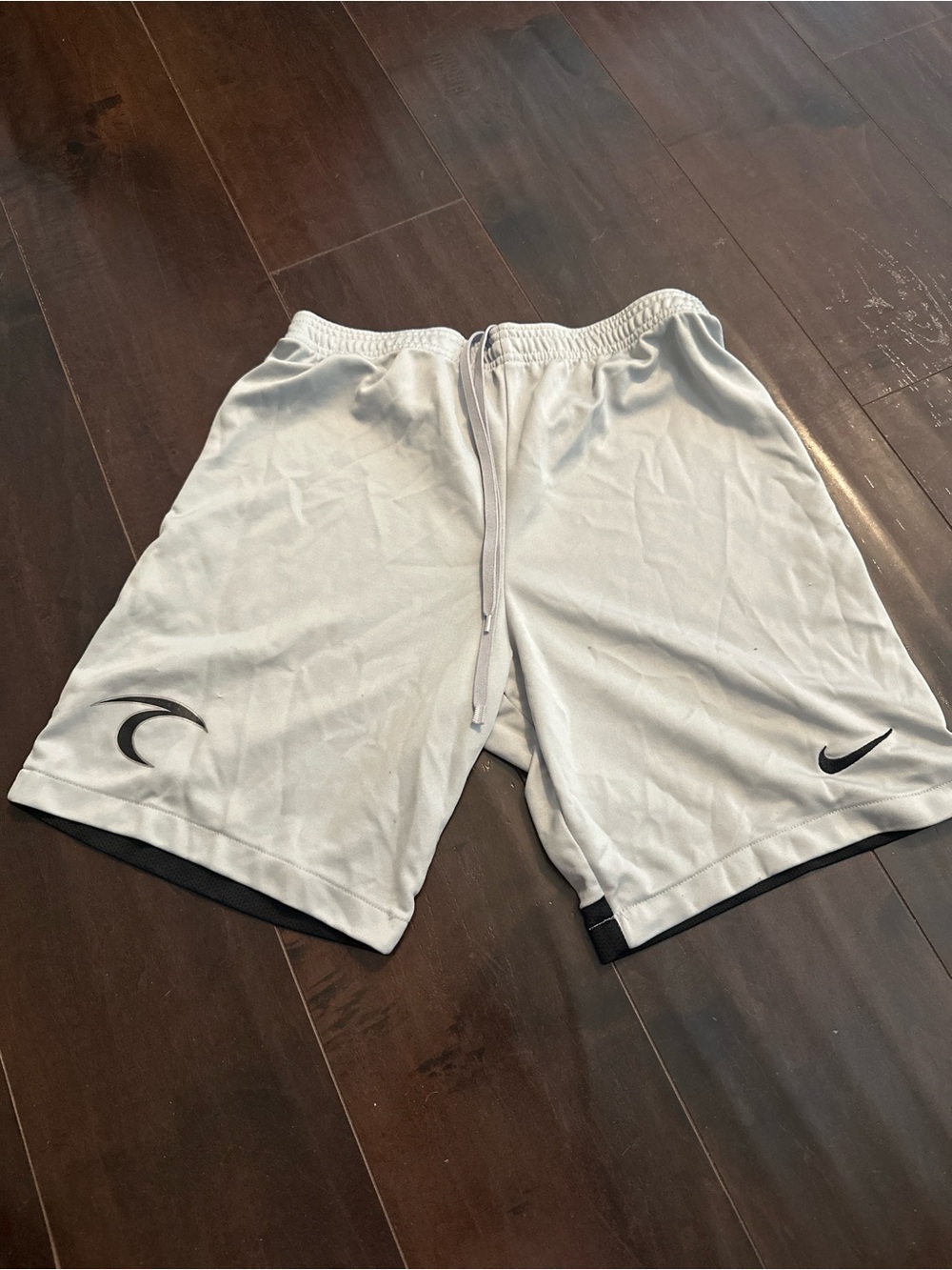 Nike White Men's Athletic Shorts with Black Logo Accents